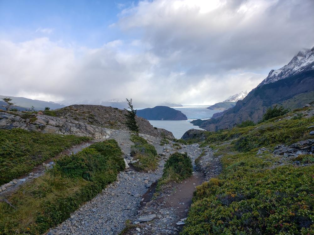 View of the trail with Grey Glacier and Grey Lake in the background