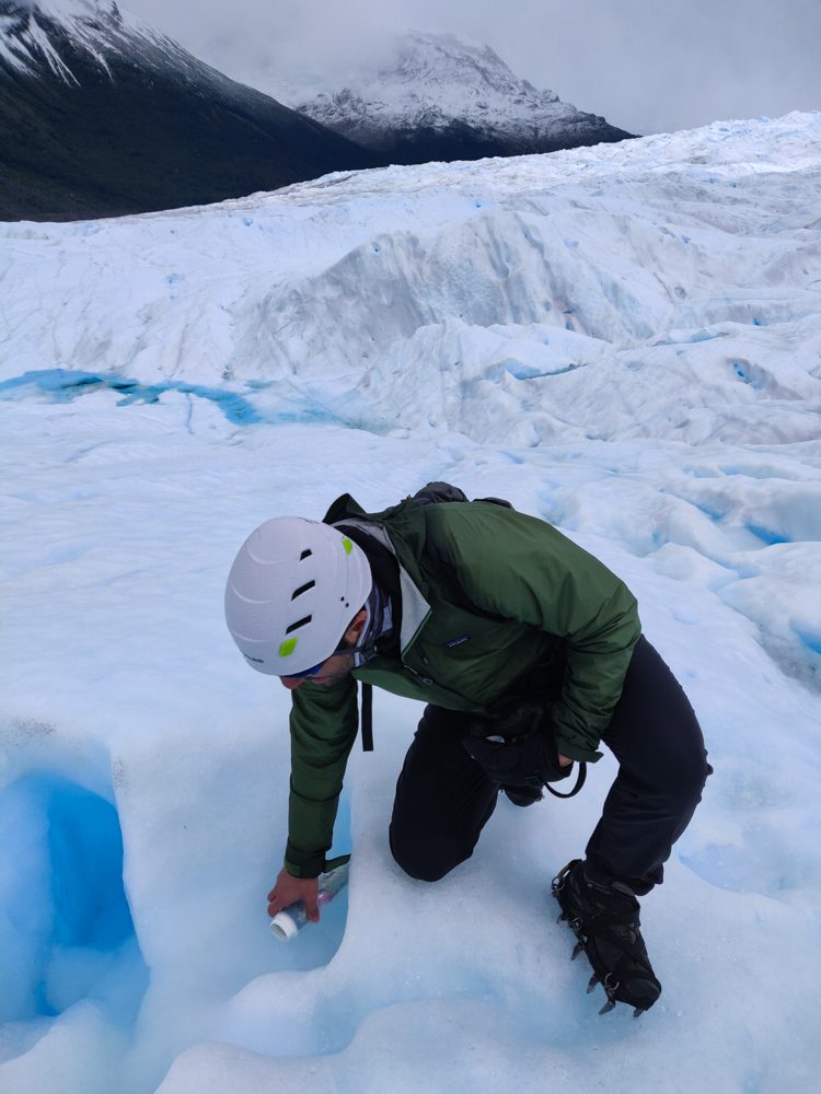 Mike filling my water bottle with glacier water