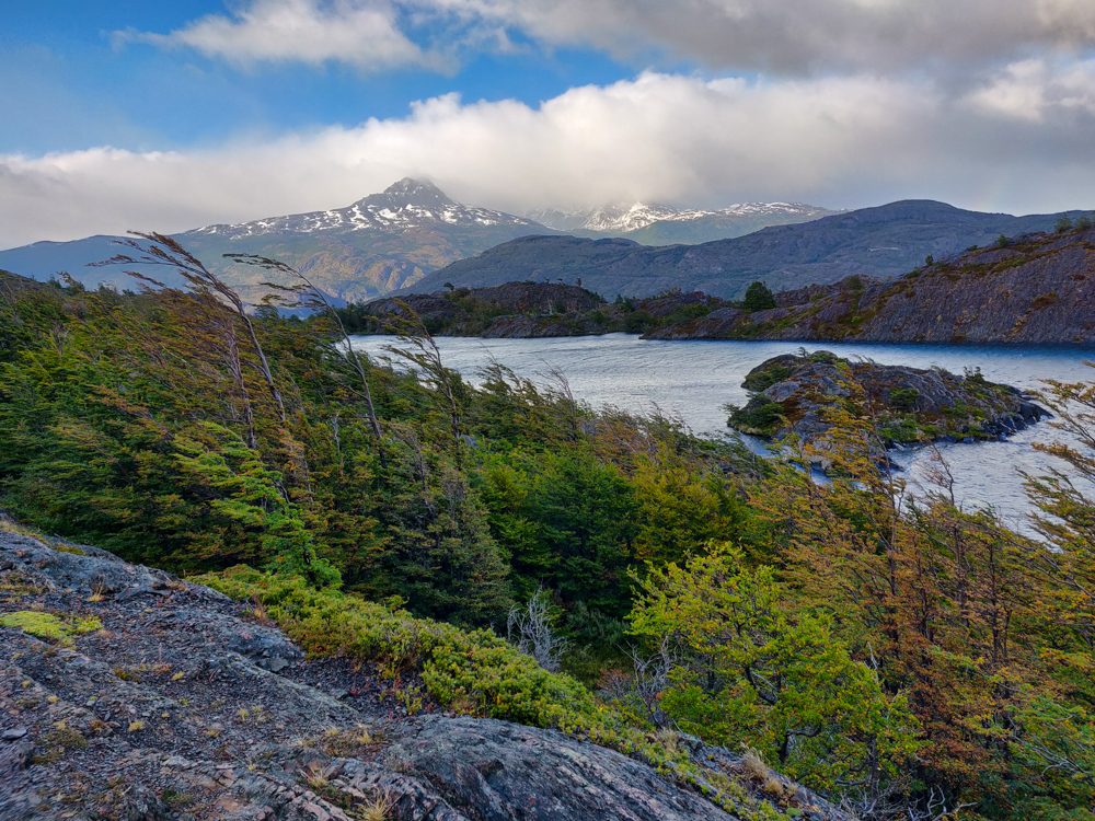 Lake views with a mountain backdrop and aggressive winds.