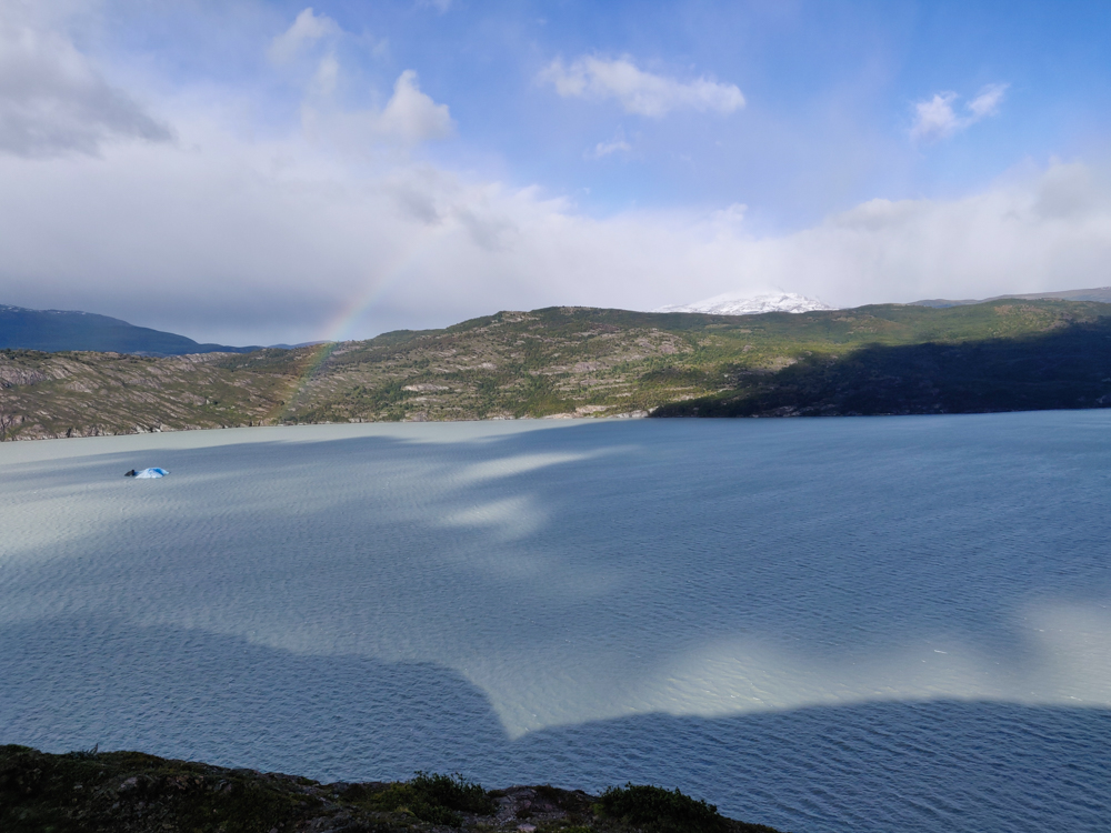 Grey Lake with a faint rainbow