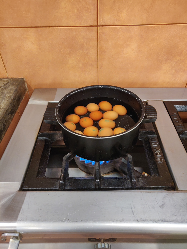 A pot filled eggs for breakfasts