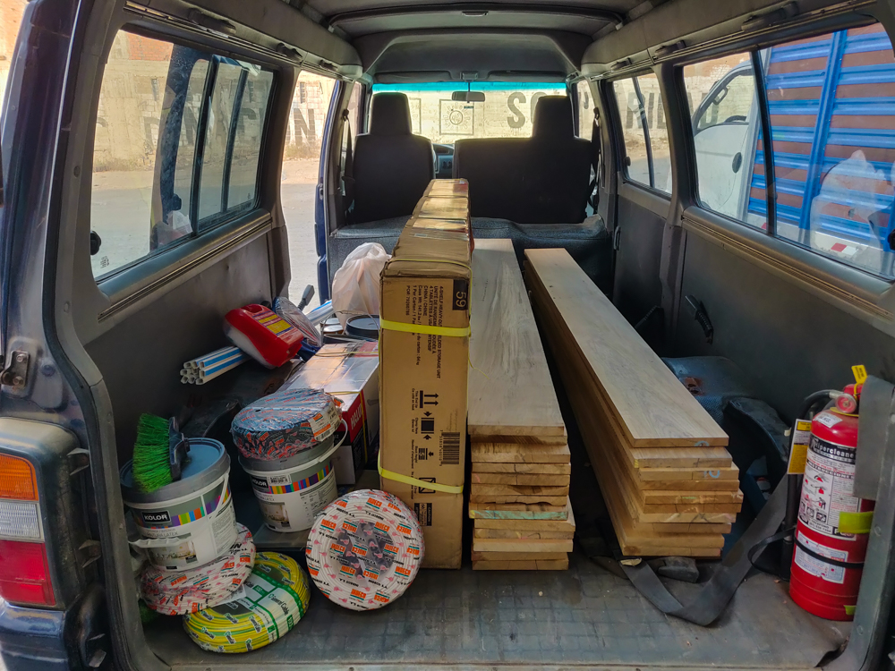 The van filled with wood and other supplies for the upcoming week