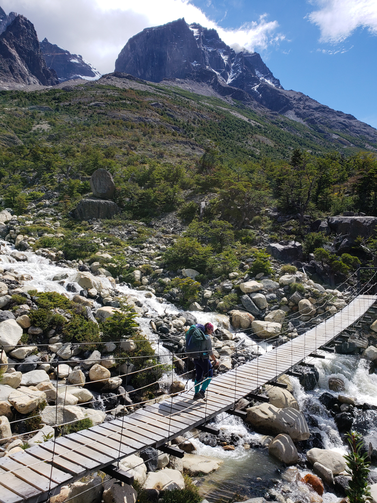 Me walking across a suspension bridge