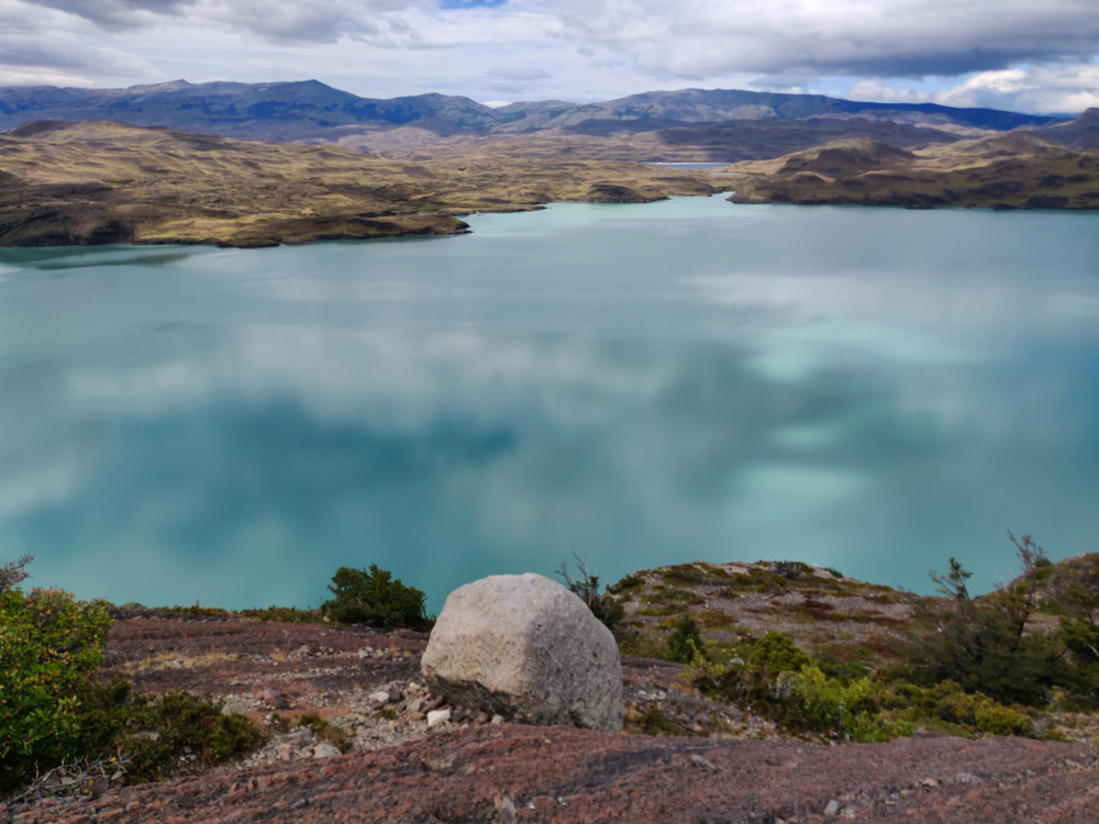 The lake with clouds reflecting on the surface