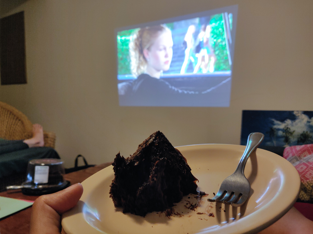 Projected movie on the wall and my cake plate!