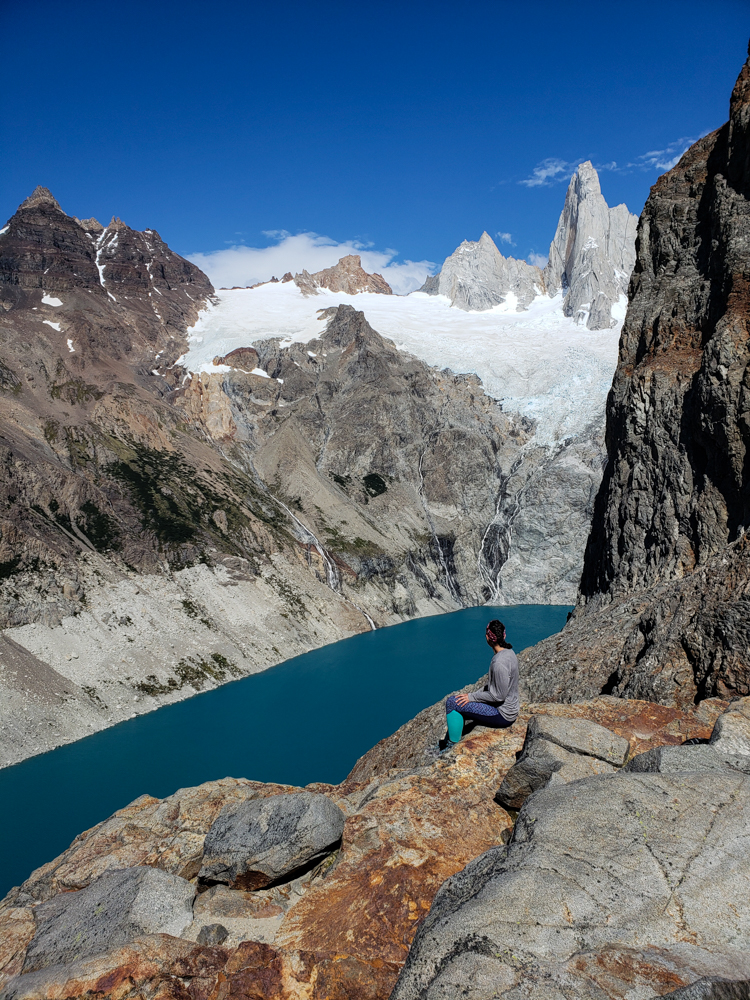 Me on a rock looking down at Laguna Sucia far below