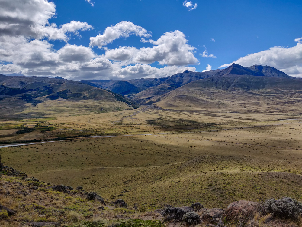 The road into El Chaltén and mountains behind it