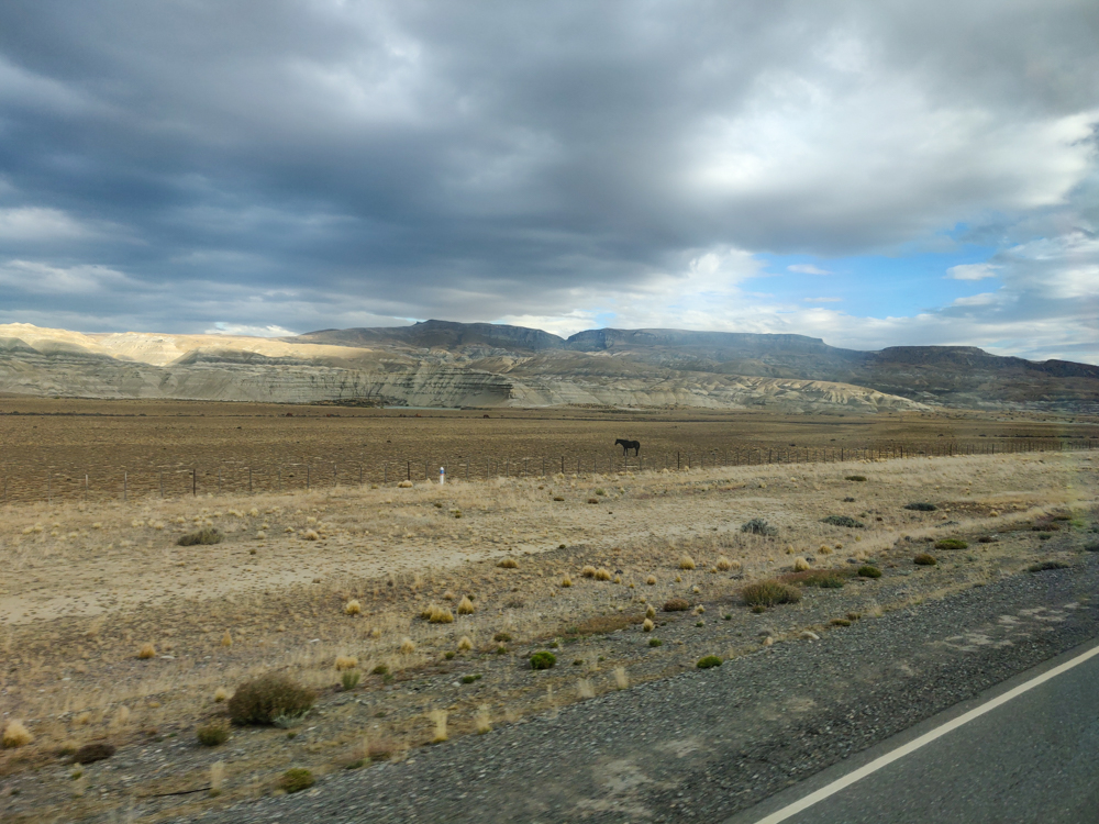 Fields topped with menacing clouds