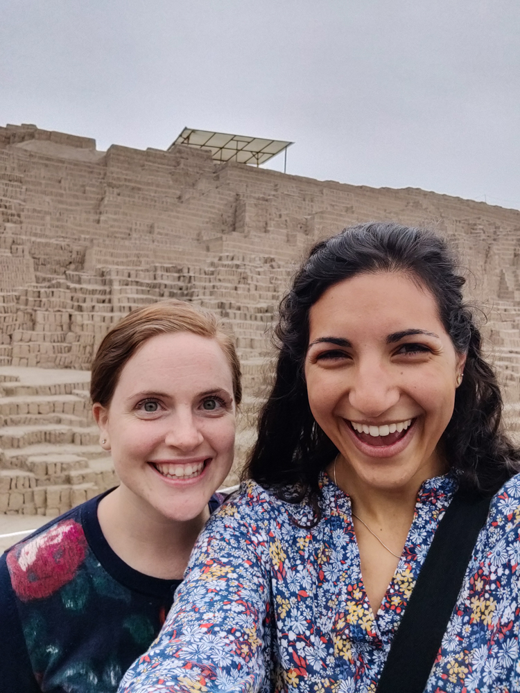 Jocelyn and me in front of a pile of mud bricks