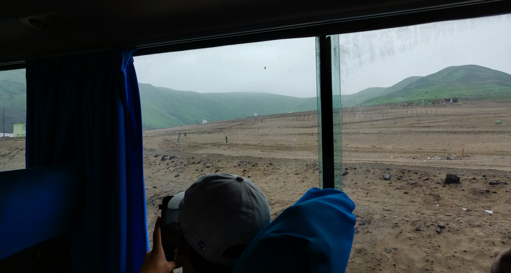 Green mountains out of the bus window