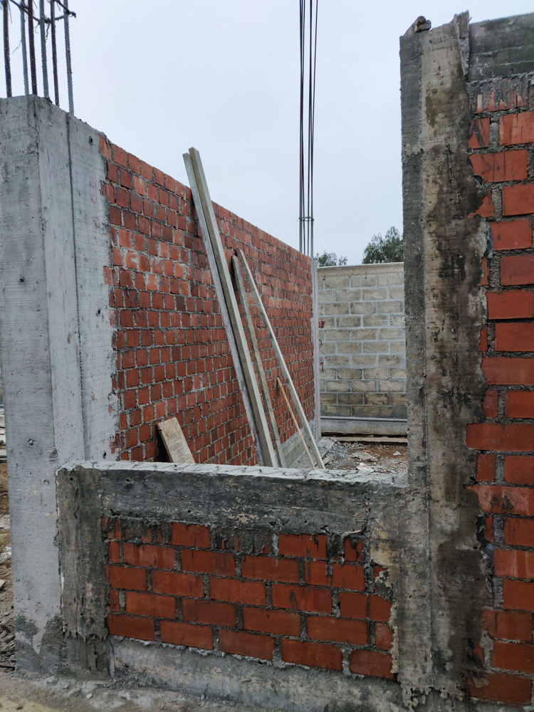 Window hole with concrete surrounding it