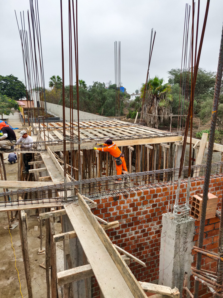 Rebar for the beams and the beginnings of the ceiling formwork