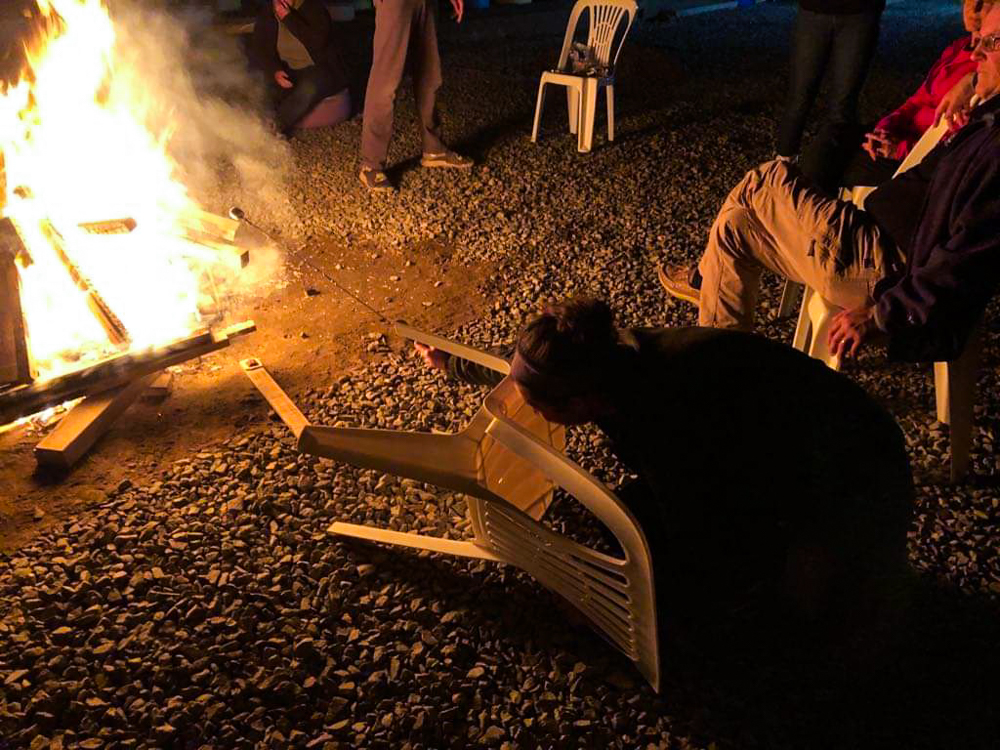 Me, hiding behind a chair to toast my marshmallow