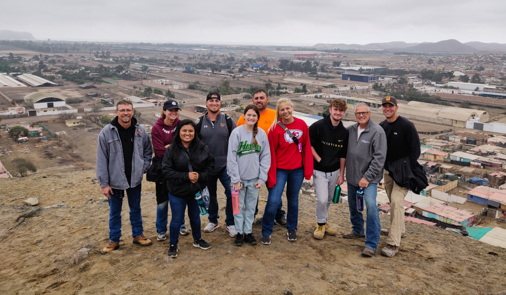 The team with our neighborhood in the background