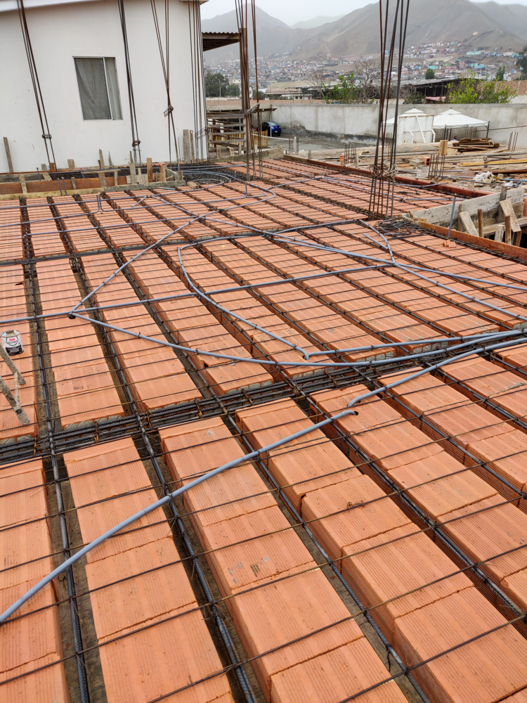 Electrical conduit zig-zagging the future ceiling/floor