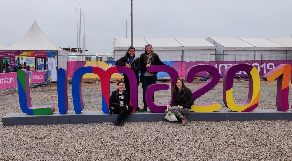 Us with a Lima 2019 sign... and the "9" is cut off