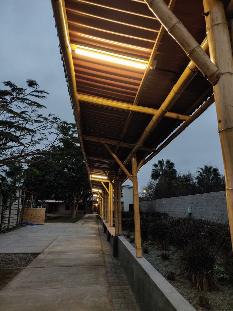 Linear lighting underneath the walkway roof shade